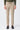 Pantaloni eleganti da uomo color tortora, beige avena, con coulisse, vestibilità affusolata e sartoriale.