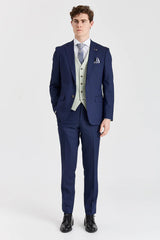 Abito blu navy Belmont con gilet a contrasto color salvia Belmont.