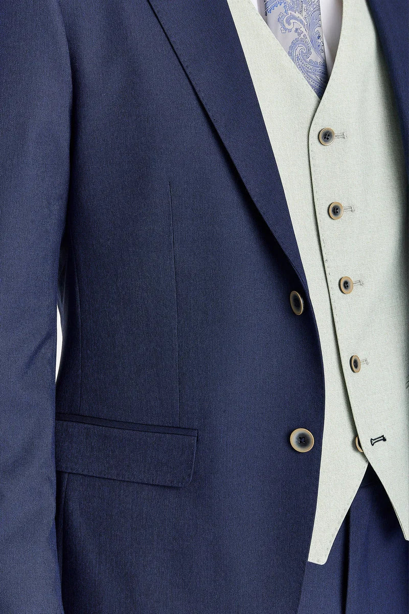 Abito blu navy Belmont con gilet a contrasto color salvia Belmont.