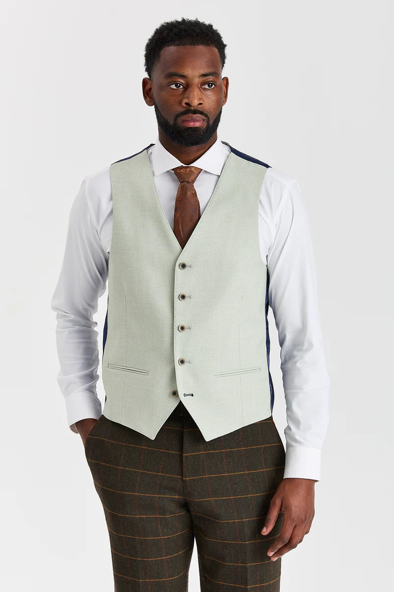 Abito in tweed a quadri verde Harris con gilet a contrasto color salvia Belmont.