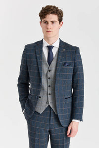 Abito Harris in tweed blu navy con gilet Harris in tweed grigio a contrasto.