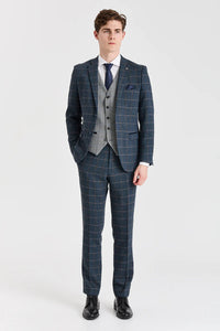 Abito Harris in tweed blu navy con gilet Harris in tweed grigio a contrasto.