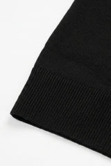 Polo da uomo nera in maglia, con scollo a zip, maniche corte, tessuto morbido.