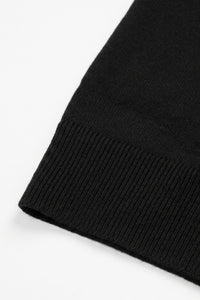 Polo da uomo nera in maglia, con scollo a zip, maniche corte, tessuto morbido.
