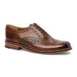 Scarpe Oxford brogue da uomo in pelle marrone con punta a coda di rondine.