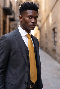 Cravatta da uomo slim tinta unita color oro