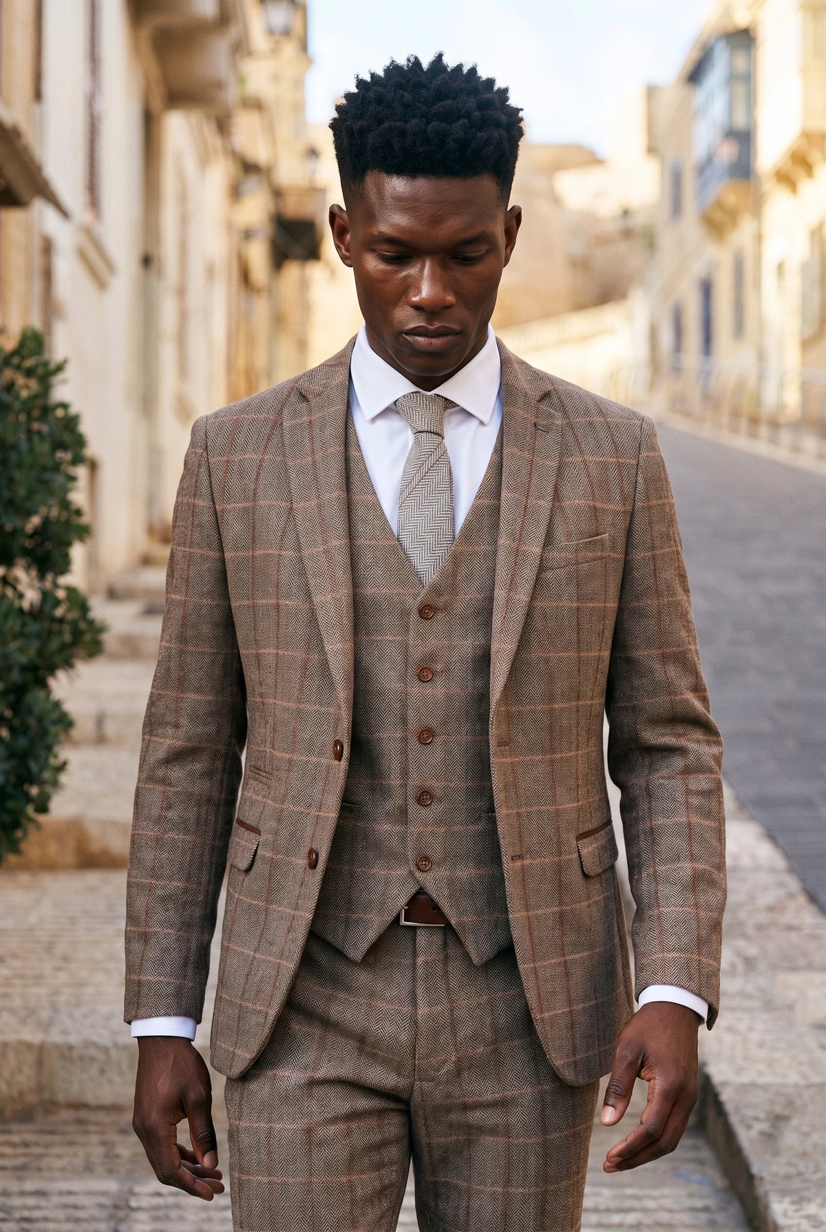 Cravatta da uomo in tweed di lana grigia con motivo a spina di pesce