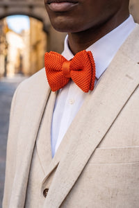 Papillon da uomo arancione lavorato a maglia
